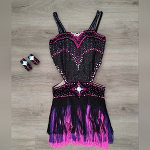 Black, pink, and purple fringe junior Latin ballroom costume.